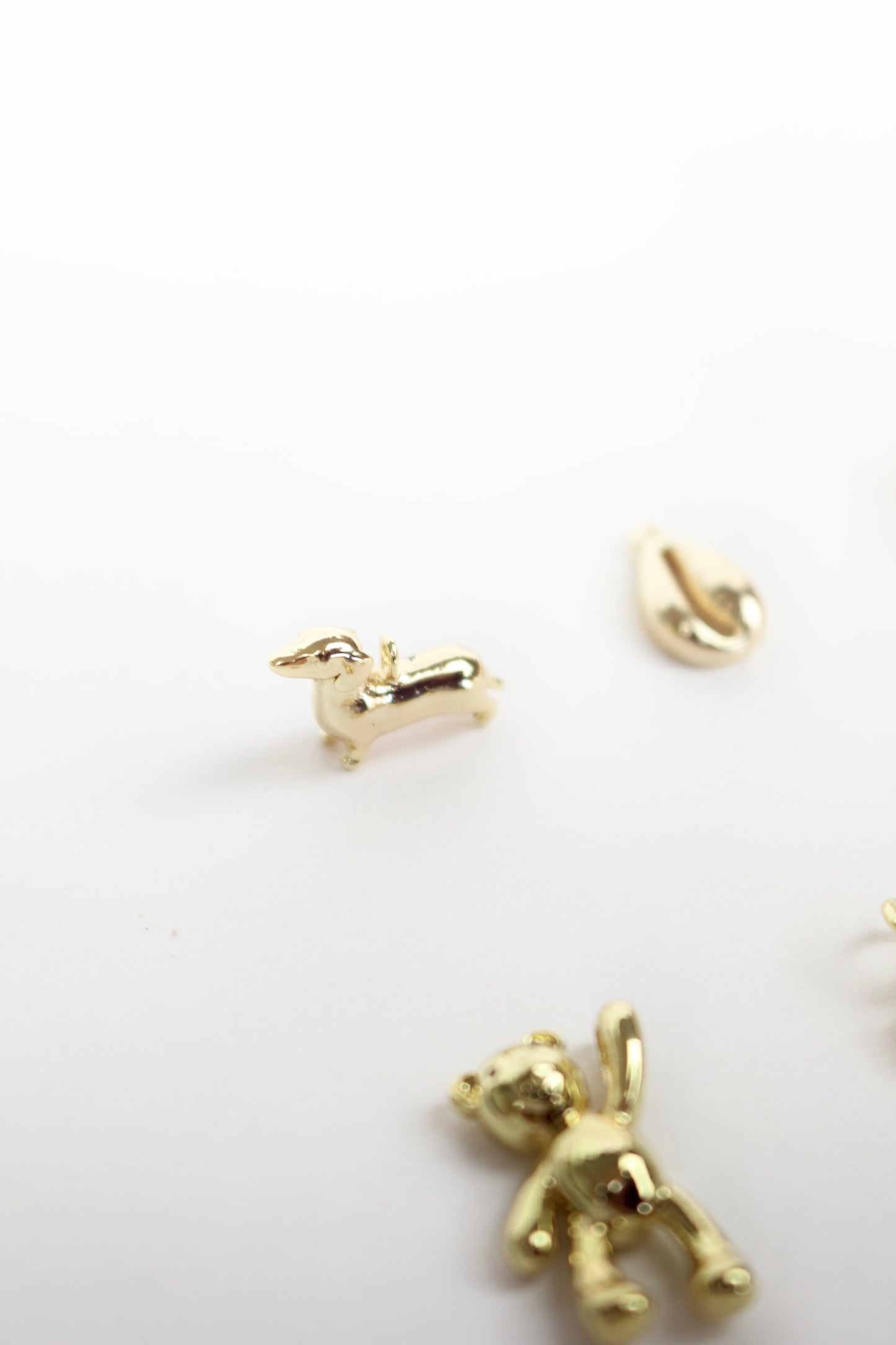 Gold plated charms