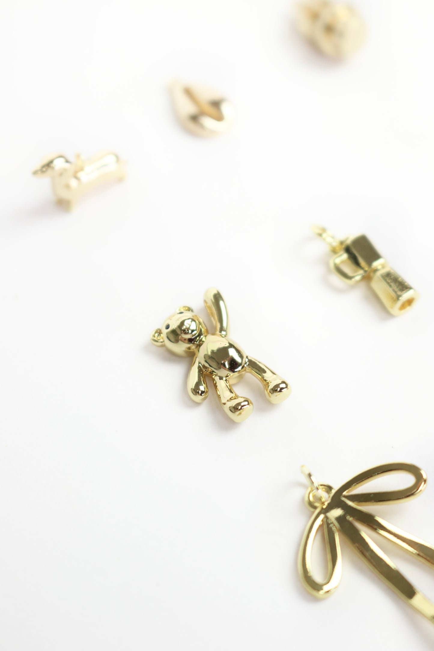 Gold plated charms