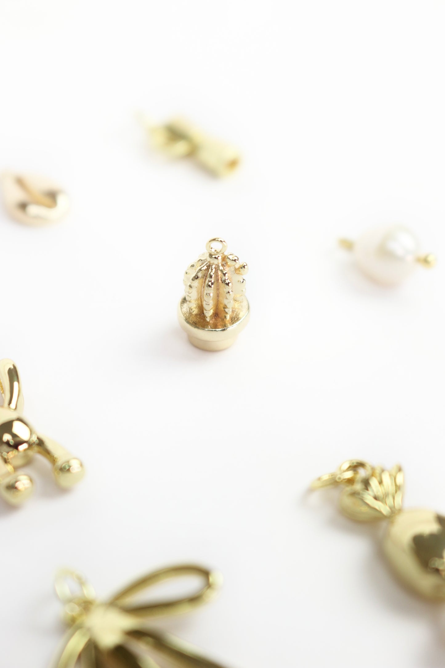 Gold plated charms